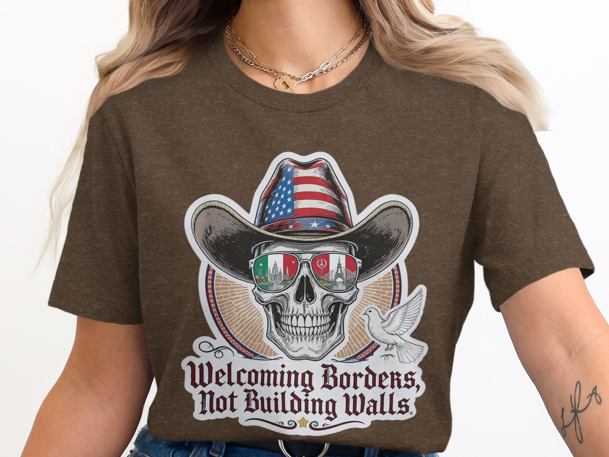 Welcoming Borders Not Building Walls Graphic Tee product