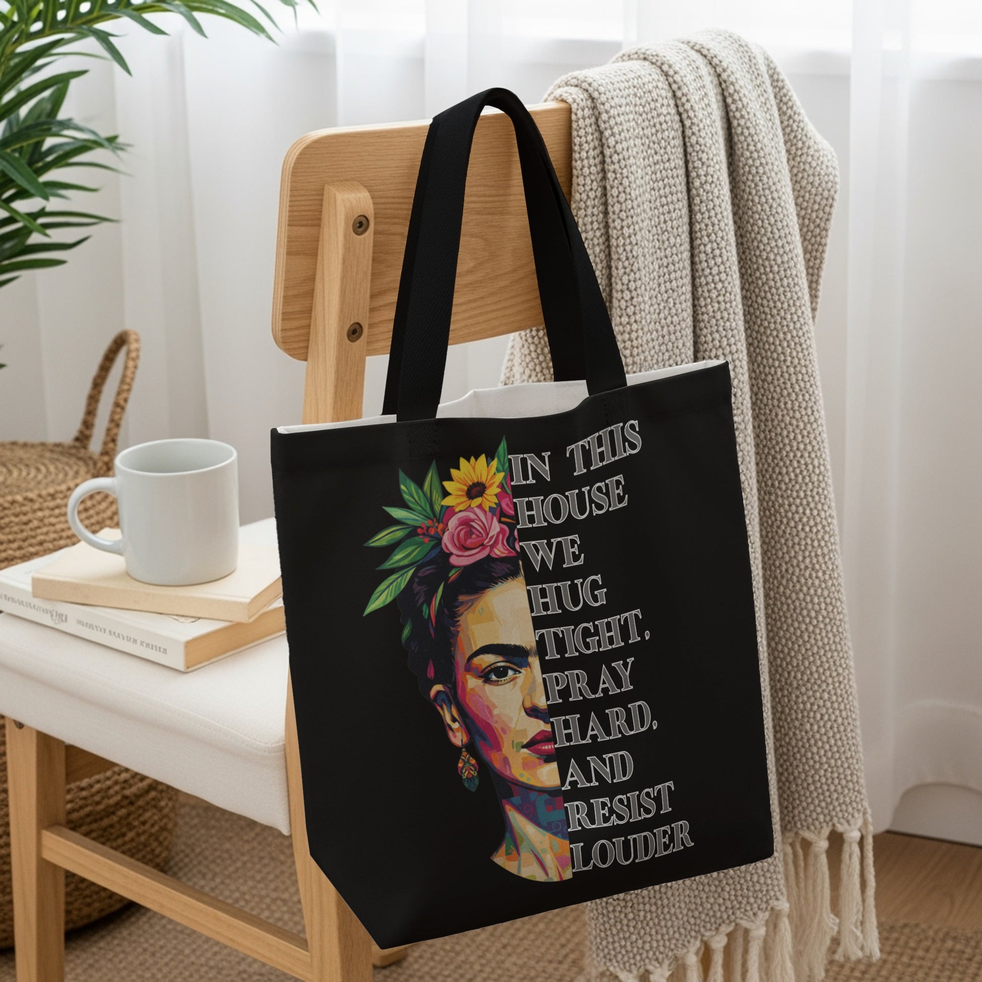 Frida Kahlo tote bag with quote "In this house we hug, fight, pray, and resist louder".